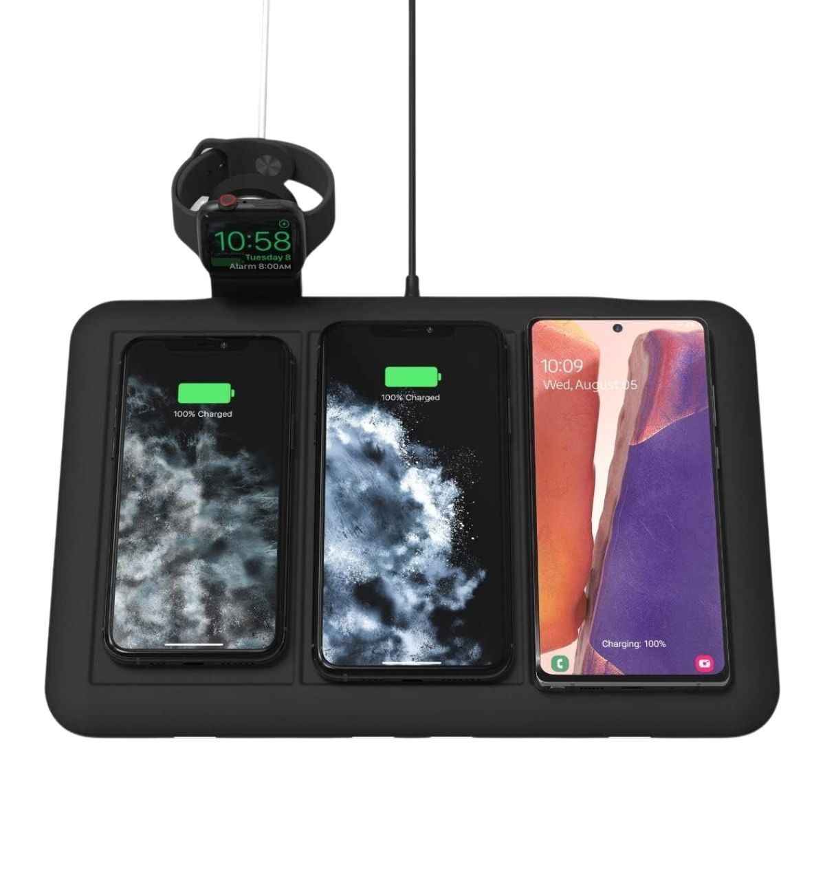 ZAGG mophie 4-in-1 Wireless Charging Mat in use: A person placing their smartphone on the charging mat, with a smartwatch and wireless earbuds already charging. Text overlay: "Power Up Your World: ZAGG mophie 4-in-1 Mat for Phone, Watch, Earbuds & More (UK).